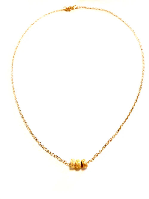 Tres Gold Stardust Necklace